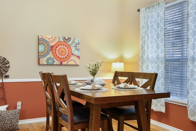 dining room featuring light hardwood / wood-style flooring