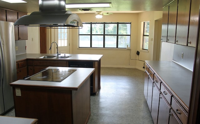 kitchen with island exhaust hood, ceiling fan, stainless steel fridge, a kitchen island, and sink