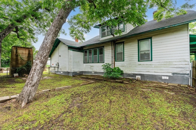 exterior space with a front yard