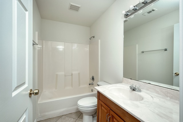 full bathroom featuring tub / shower combination, tile flooring, toilet, and vanity with extensive cabinet space