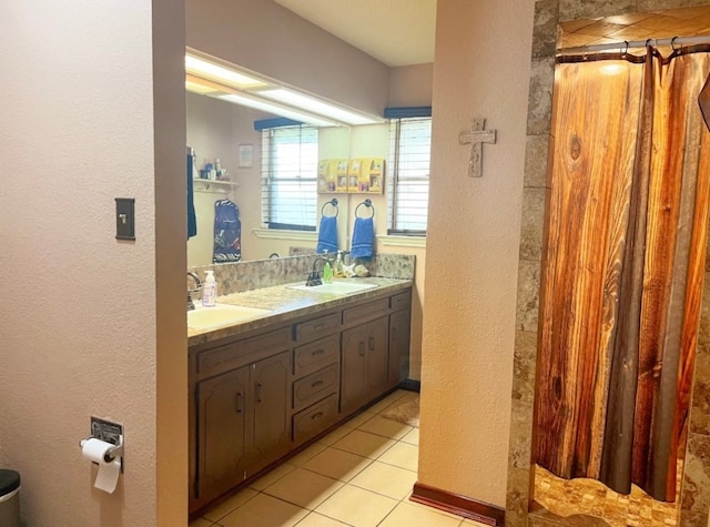 bathroom with vanity and tile patterned floors