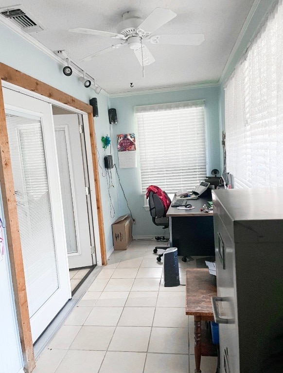 office area with crown molding, ceiling fan, rail lighting, and light tile patterned floors