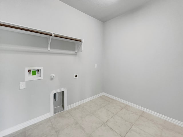 laundry room with hookup for a washing machine, electric dryer hookup, hookup for a gas dryer, and light tile floors