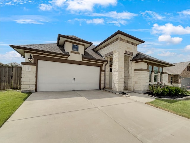 prairie-style home with a garage