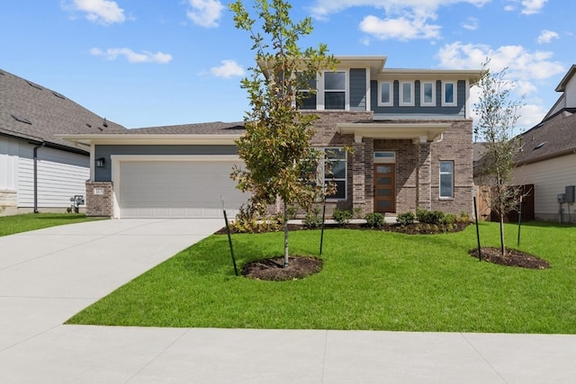 prairie-style home with a garage and a front yard