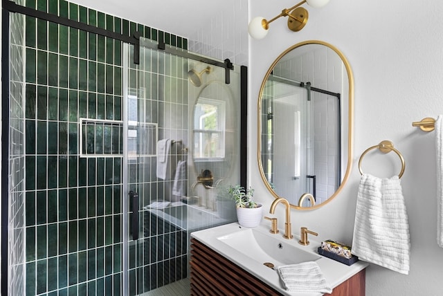 bathroom with walk in shower and vanity