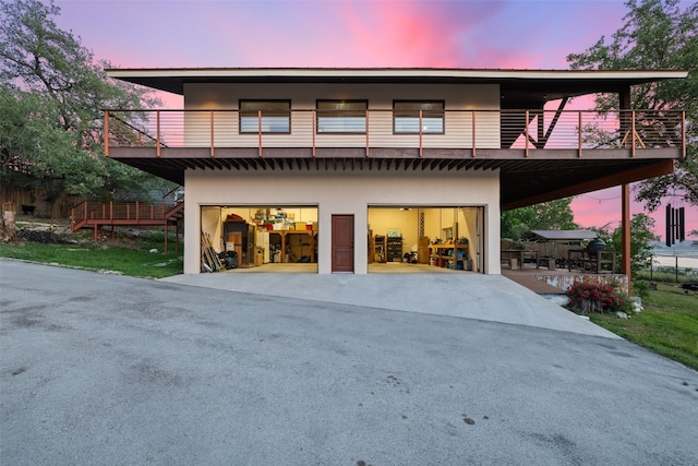 view of front of property with a balcony