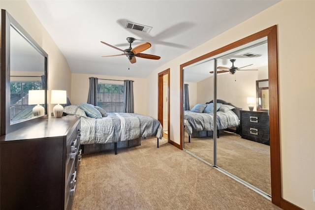 bedroom featuring light carpet and ceiling fan