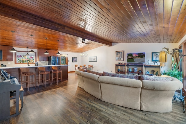 living room with indoor bar, ceiling fan, hardwood / wood-style floors, wood ceiling, and lofted ceiling with beams