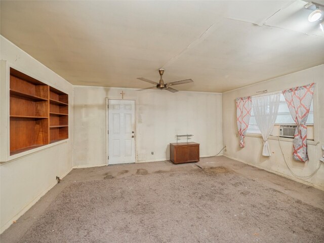 interior space with ceiling fan