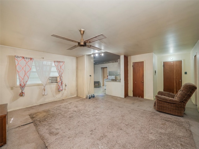 interior space with ceiling fan and carpet floors