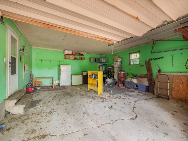 garage featuring white refrigerator