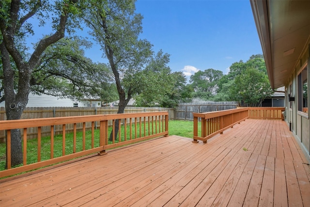 deck featuring a lawn