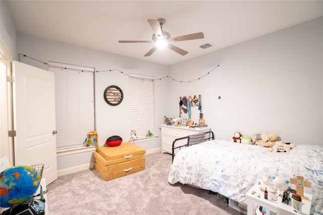 carpeted bedroom featuring ceiling fan