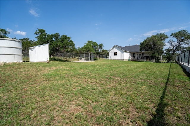 view of yard with a storage shed