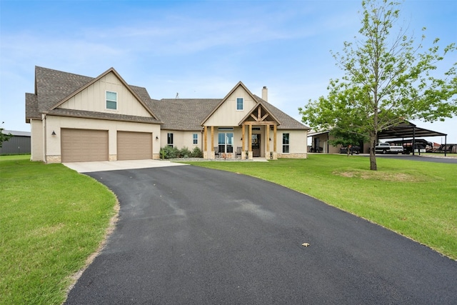 craftsman-style home with a garage, a front yard, and a carport