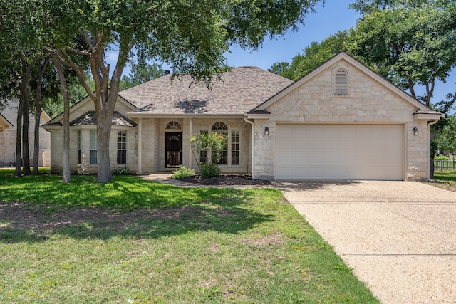 single story home featuring a garage and a front yard