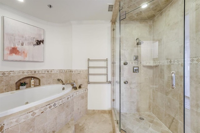 bathroom featuring a bath, a stall shower, and crown molding