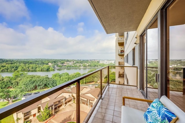 balcony featuring a water view