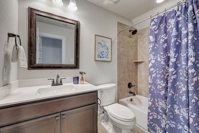 full bathroom with vanity, shower / tub combo, a textured ceiling, and toilet