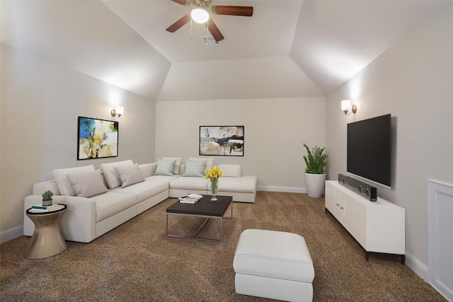 living room featuring ceiling fan, lofted ceiling, and dark colored carpet