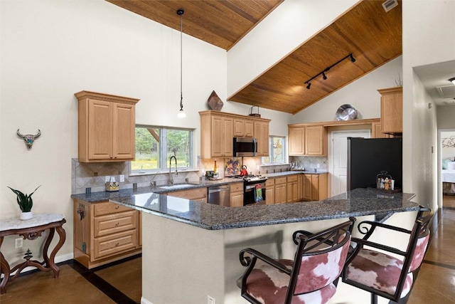 kitchen with decorative backsplash, kitchen peninsula, stainless steel appliances, sink, and wooden ceiling