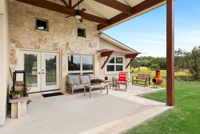 view of patio / terrace with french doors and ceiling fan