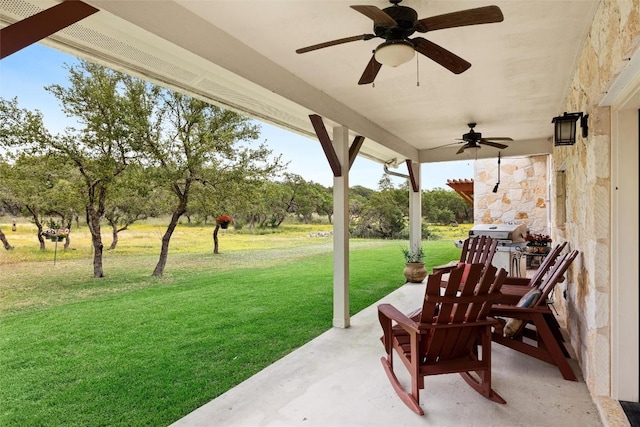 view of patio with ceiling fan