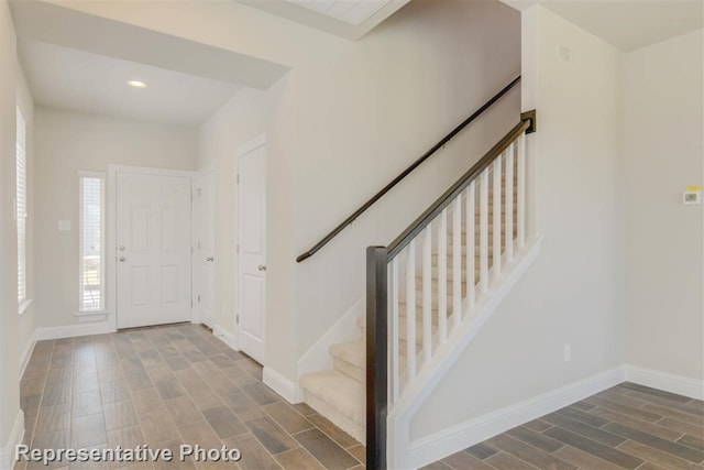 foyer featuring dark wood-type flooring