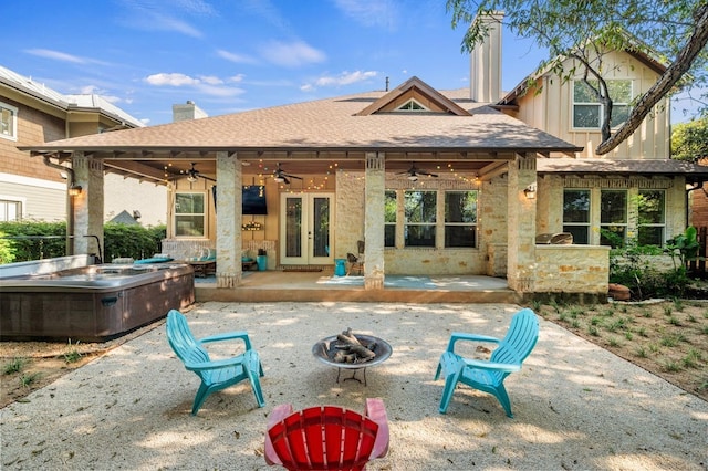 back of house featuring a patio, ceiling fan, and an outdoor fire pit