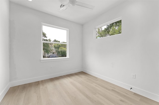 unfurnished room featuring ceiling fan and light hardwood / wood-style flooring