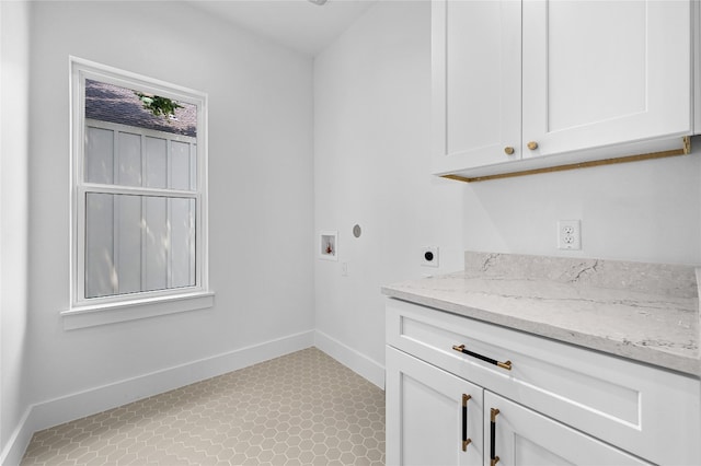 clothes washing area featuring washer hookup, cabinets, and hookup for an electric dryer