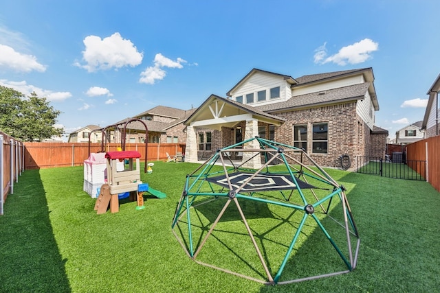 view of play area with a lawn