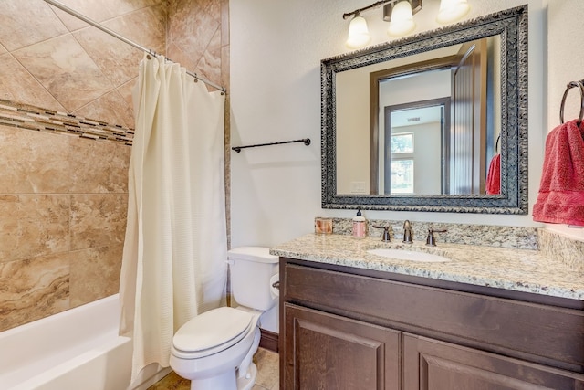 full bathroom with vanity, toilet, and shower / bath combo with shower curtain