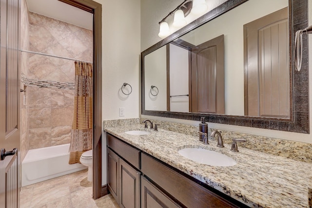 full bathroom with shower / bath combo with shower curtain, vanity, and toilet