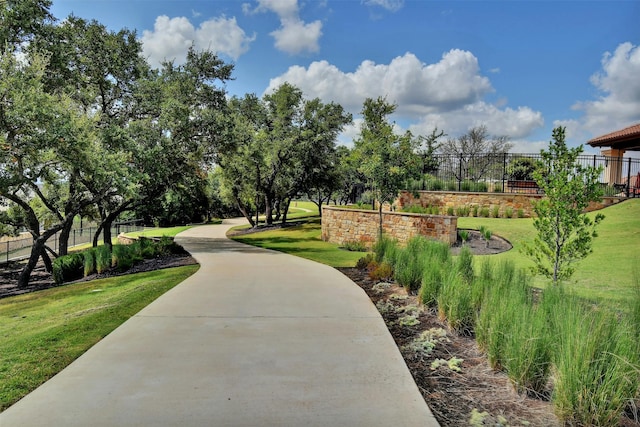 view of home's community featuring a yard