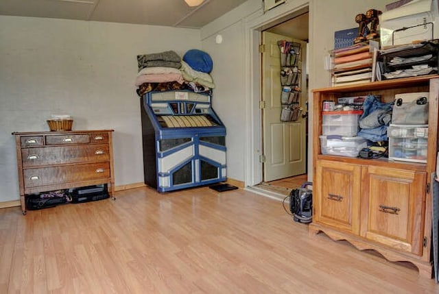 bedroom with light hardwood / wood-style floors