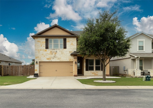 view of front of property featuring a garage, central AC unit, and a front lawn