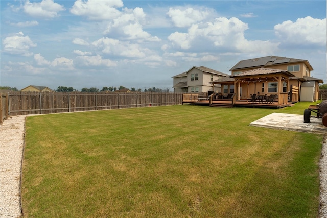 view of yard featuring a deck and a gazebo