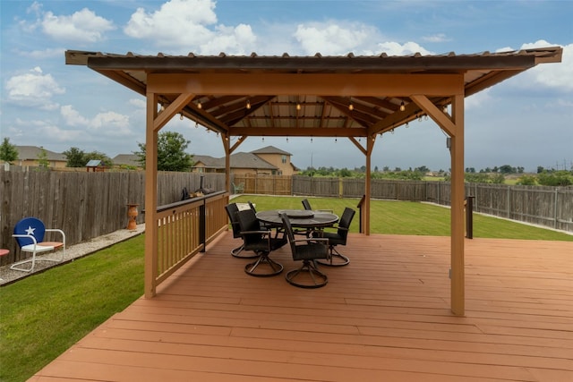 deck with a yard and a gazebo