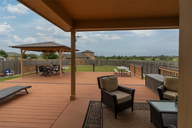 deck featuring an outdoor living space and a gazebo