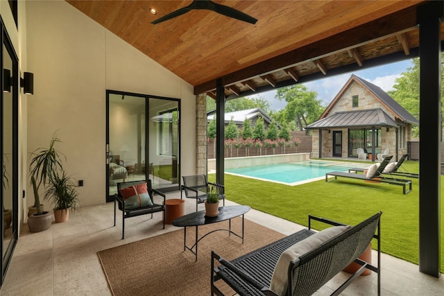 view of patio / terrace featuring ceiling fan, a gazebo, and a fenced in pool