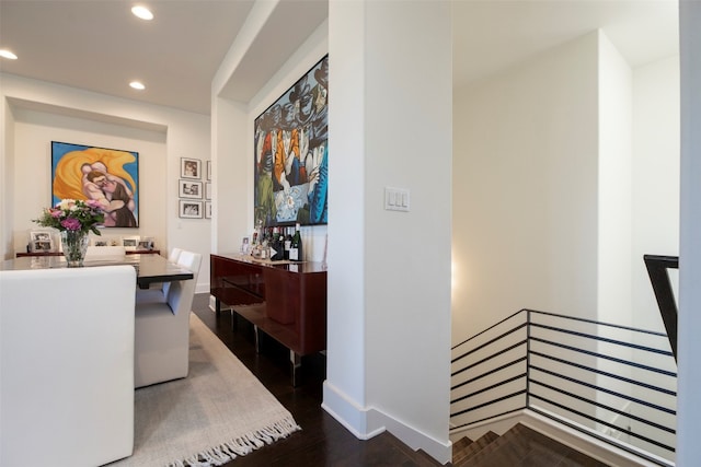 hallway featuring dark hardwood / wood-style flooring