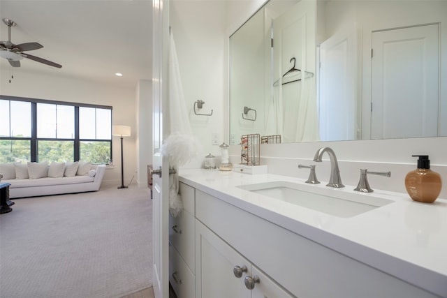 bathroom featuring ceiling fan and vanity