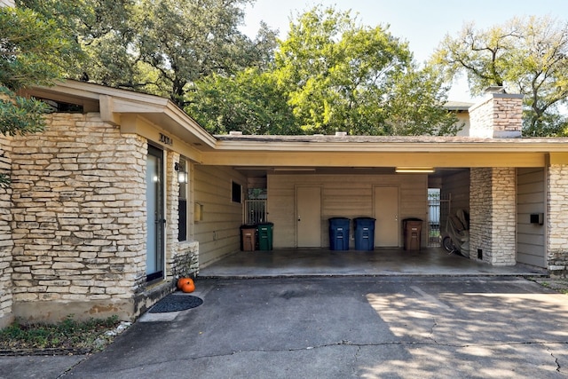 exterior space featuring a carport