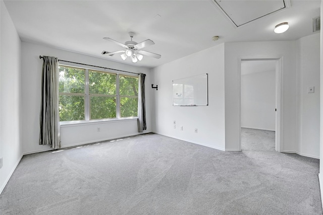 unfurnished room featuring ceiling fan and carpet flooring