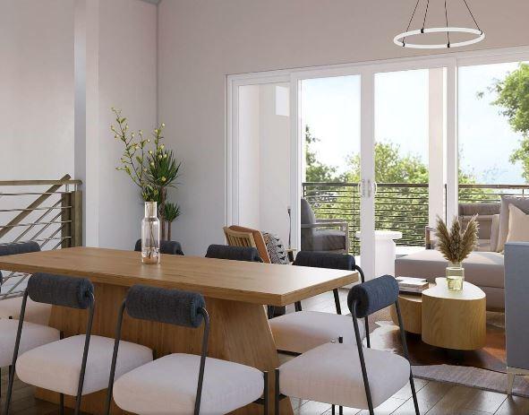 dining space with hardwood / wood-style floors