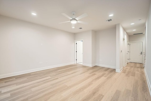 spare room with ceiling fan and light hardwood / wood-style flooring