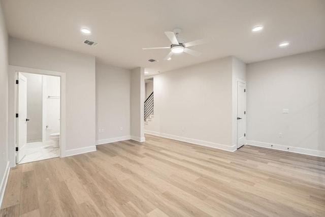 interior space with light hardwood / wood-style floors and ceiling fan