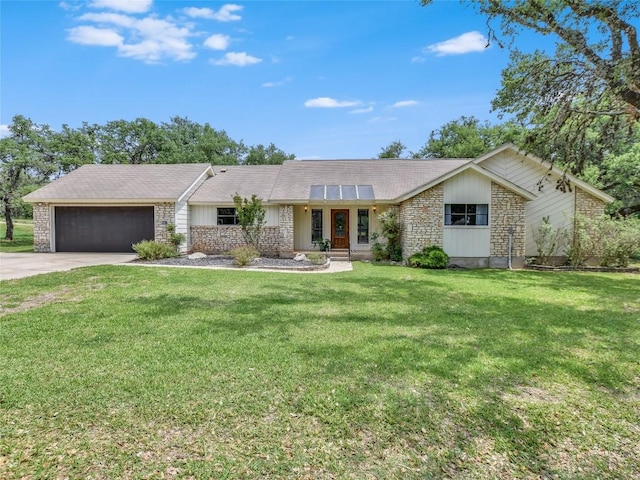 single story home with a front yard and a garage